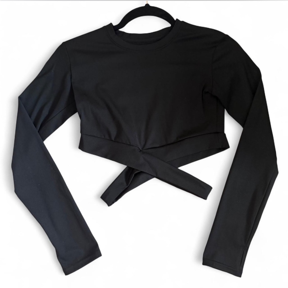 Black long sleeve tight crop top with criss-cross detail